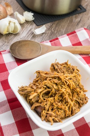 Make your own flavorful dry rub and BBQ sauce with this pulled pork recipe! Mouthful of boldly sweet, salty, and spicy juice ooze out of moist and tender pulled pork. Irresistible! Perfect with sandwiches, wraps, rice, or ANYTHING.